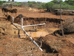 Damaged wastewater system caused by flood waters