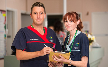 Two nurses standing in a hospital