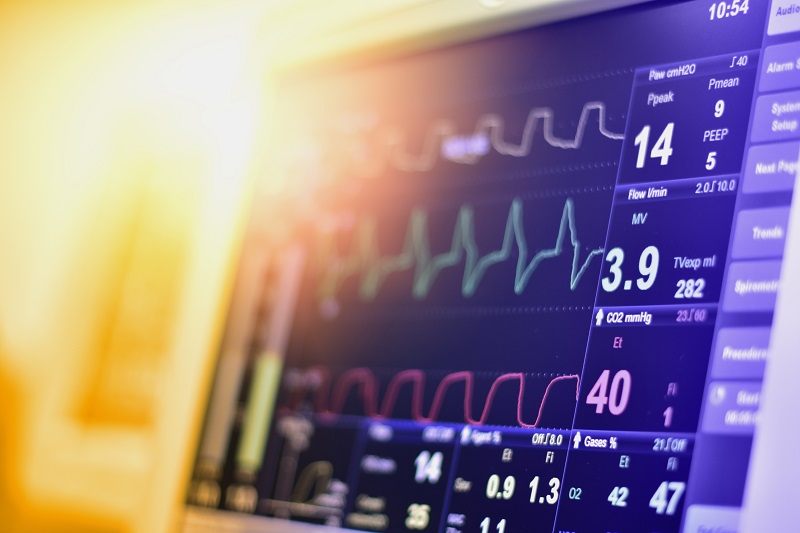 Heart monitor showing figures onscreen.