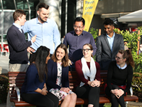 a group photo of young men and women