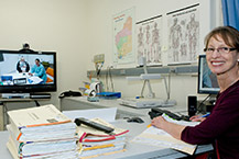Specialist conducting an appointment with a patient via telehealth