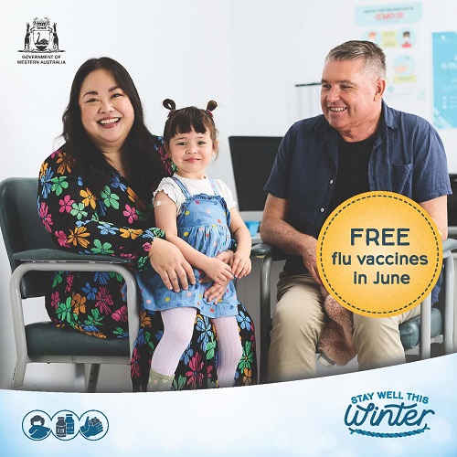 Family of three sitting doctors office after getting the flu vaccine